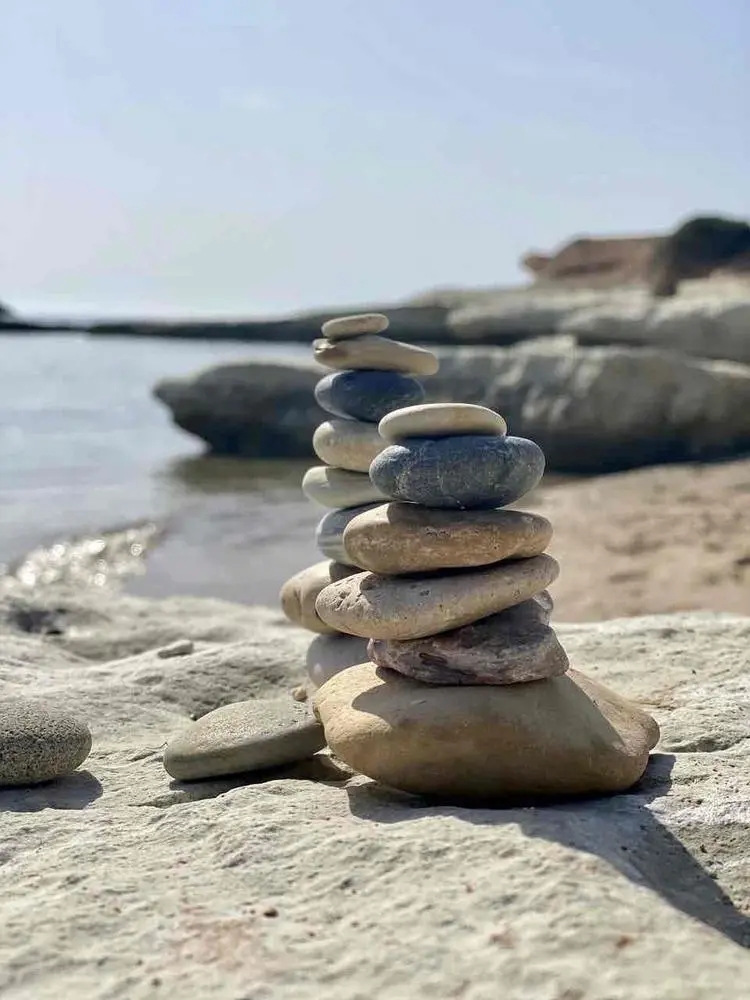 The zen of rock balancing 🪨🌊🌐🌱