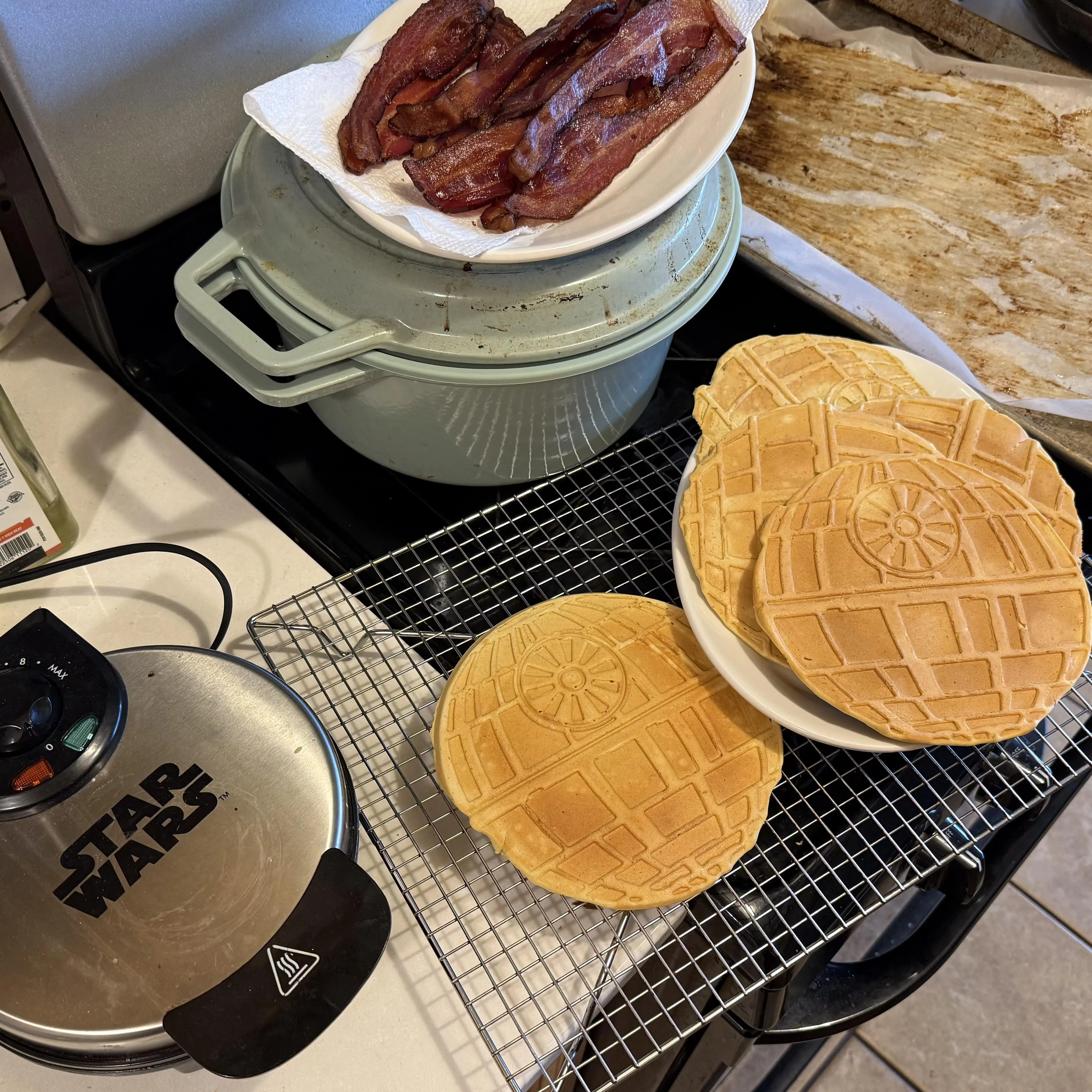 That’s no moon, it’s a waffle!



Falafel? Well, you tell me! I wanted high protein, low carb, high experience.



Savory herb’n’spice Death Star waffles made with chickpea flour, Greek yogurt, and chicken stock. Used some ground thyme with a blend of cumin, smoked paprika, garlic, onion, and salt. I put them on a rack in the oven to keep warm and prevent them from steaming, retaining the crispness.



Oven baked bacon with my favorite method of laying out the slices on a parchment lined cookie ...